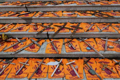 Victoria, BC Canada - October 16, 2021:  Every Child Matters Orange Shirts on British Columbia Legislature Building Steps, Symbol of Canada National Day for Truth and Reconciliation